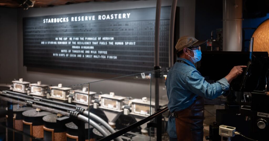 A barista operates machinery at Starbucks Reserve Roastery, showcasing the coffee production process.